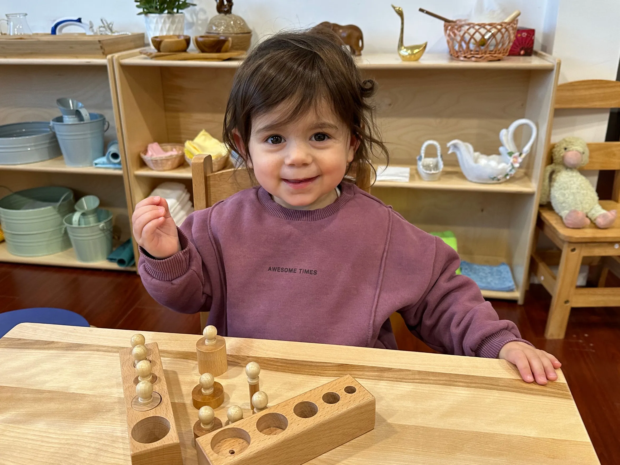 Children learning with Montessori materials.